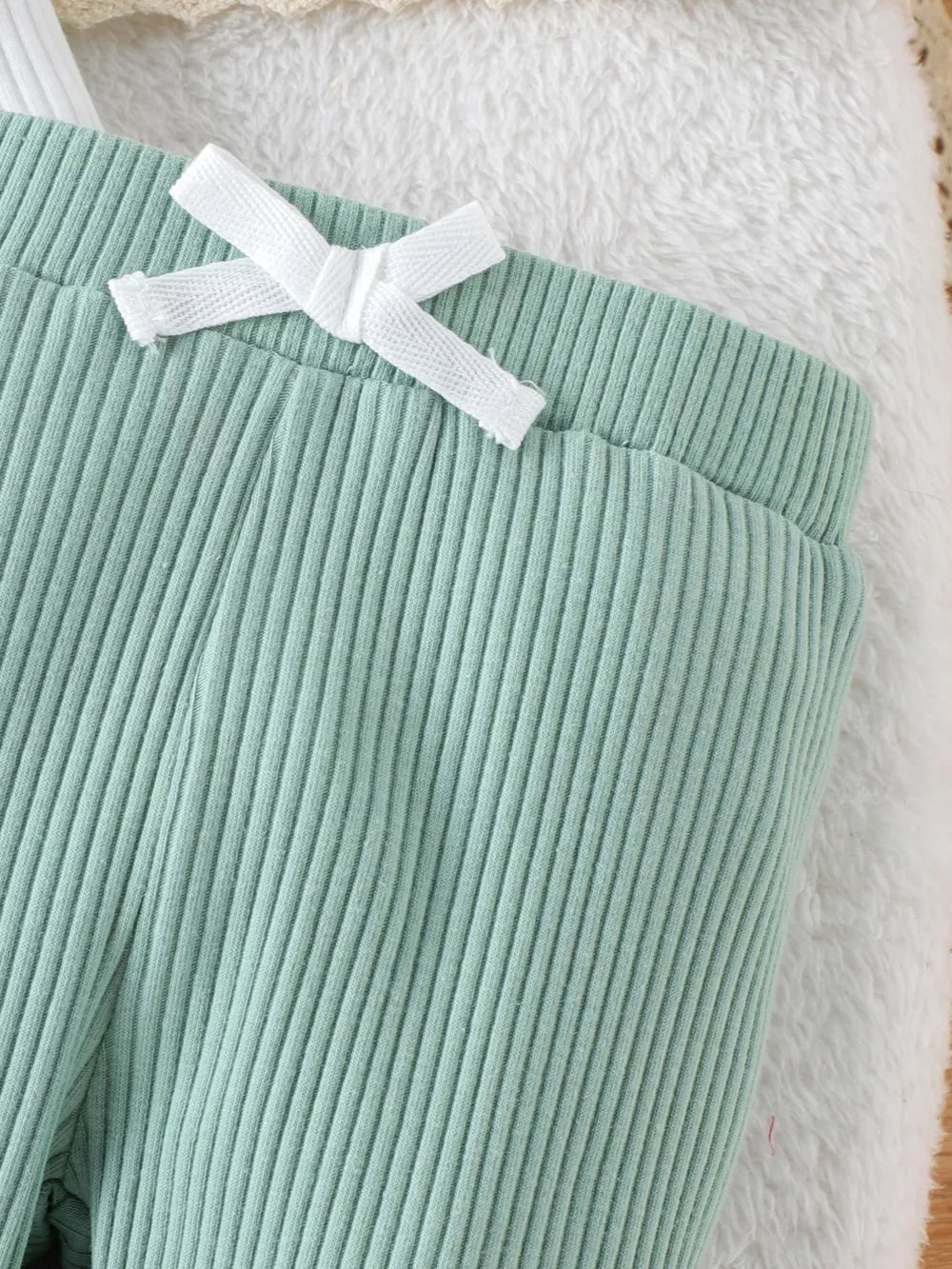 Children's Ruffled Polka Dot Bodysuit And Pants Set in Light Green, back view