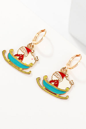 Festive Santa charm hoop earrings with gold-tone alloy and colorful enamel details.