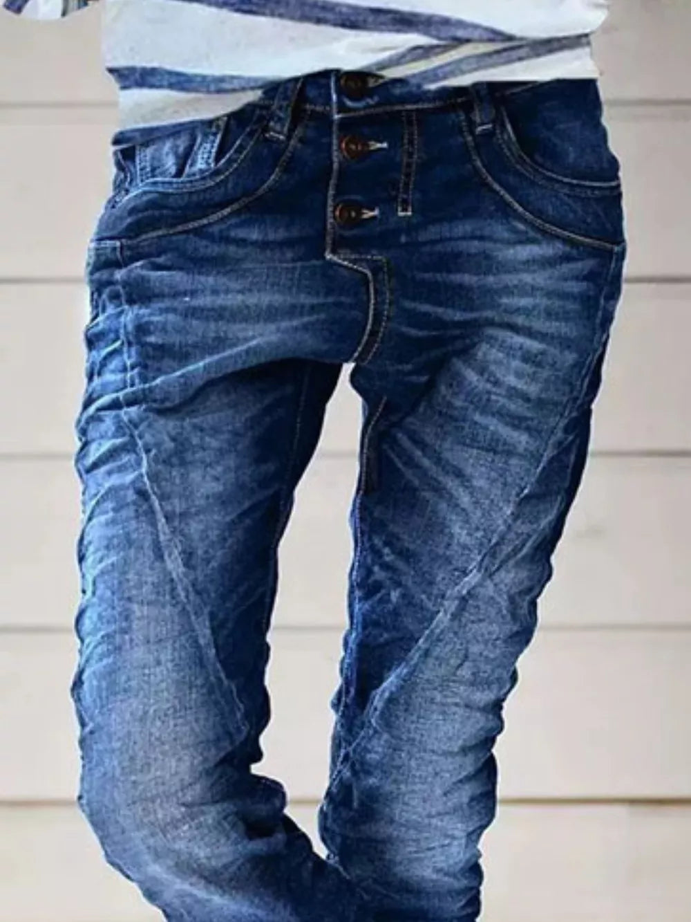 Dark blue cuffed button-fly jeans with textured detailing