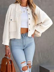 White waffle knit cropped utility jacket with button front and chest pockets