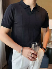 Black textured knit polo shirt with vertical ribbing and a V-neck collar.