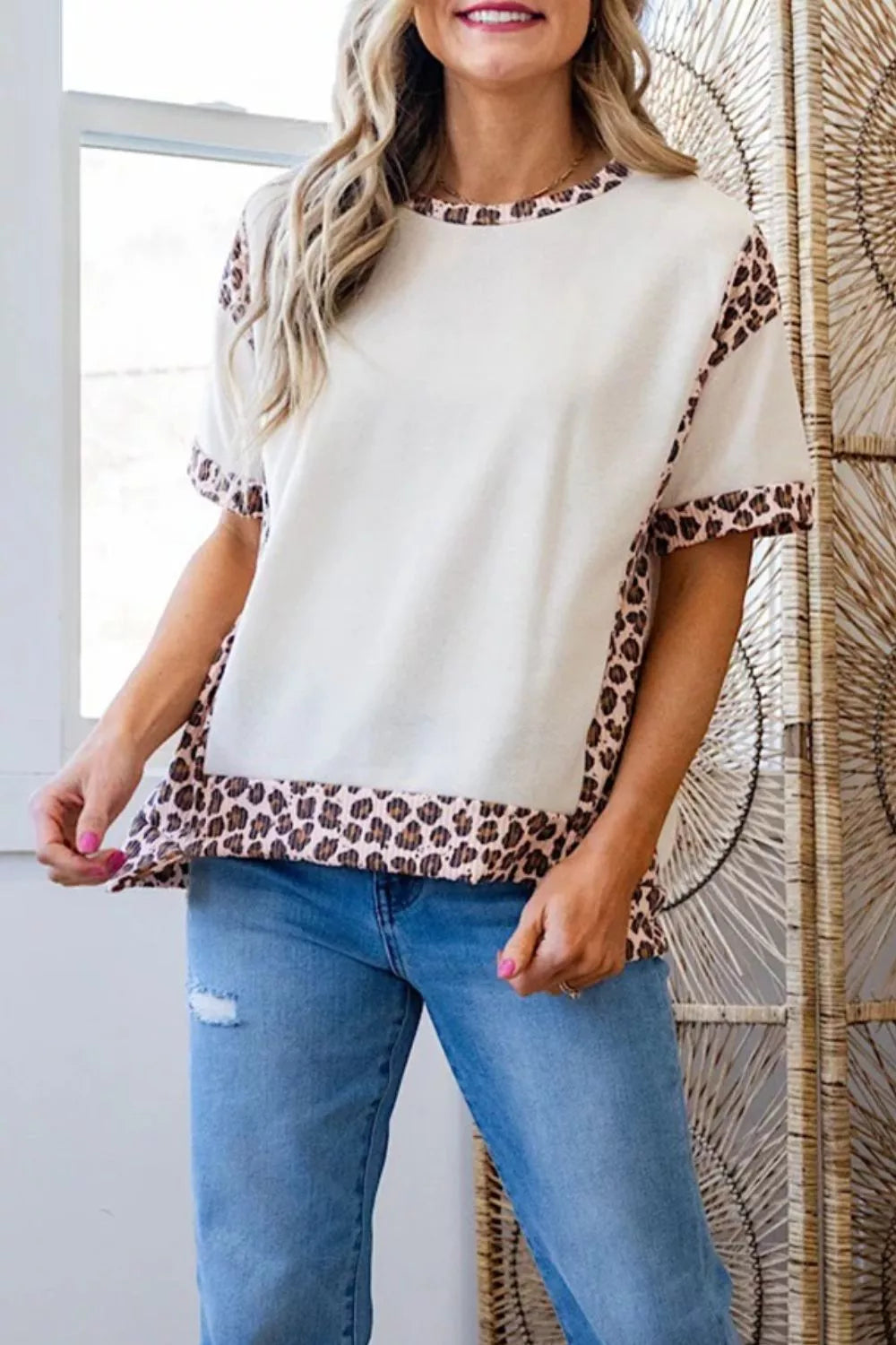 Beige cotton maternity t-shirt with leopard print trim on neckline, sleeves, and hem.