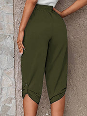 Button-detail cropped culottes in Matcha Green with a cinched hem and button accent.