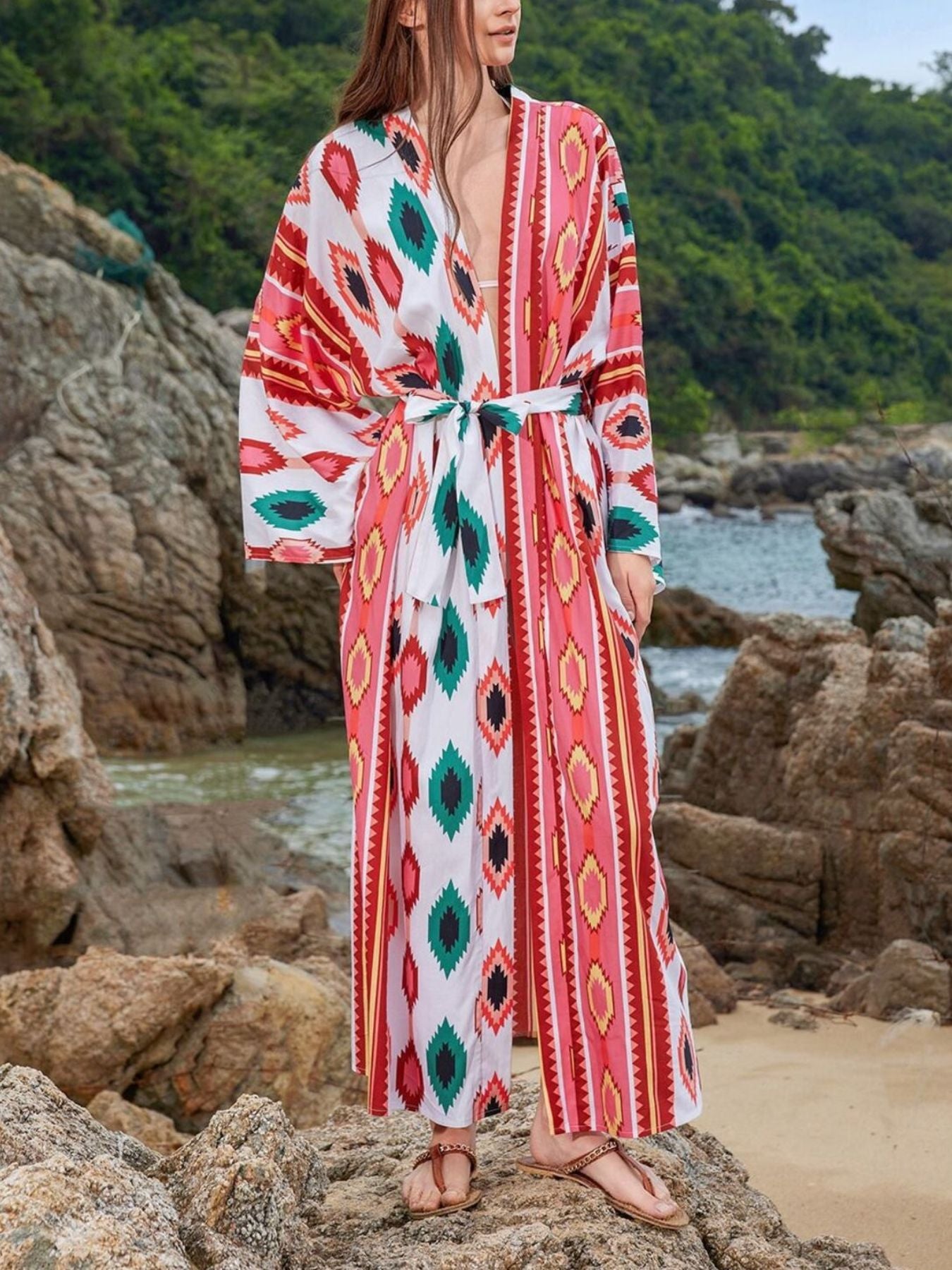 Boho print maxi beach cover-up with tie waist and geometric pattern in red and green.