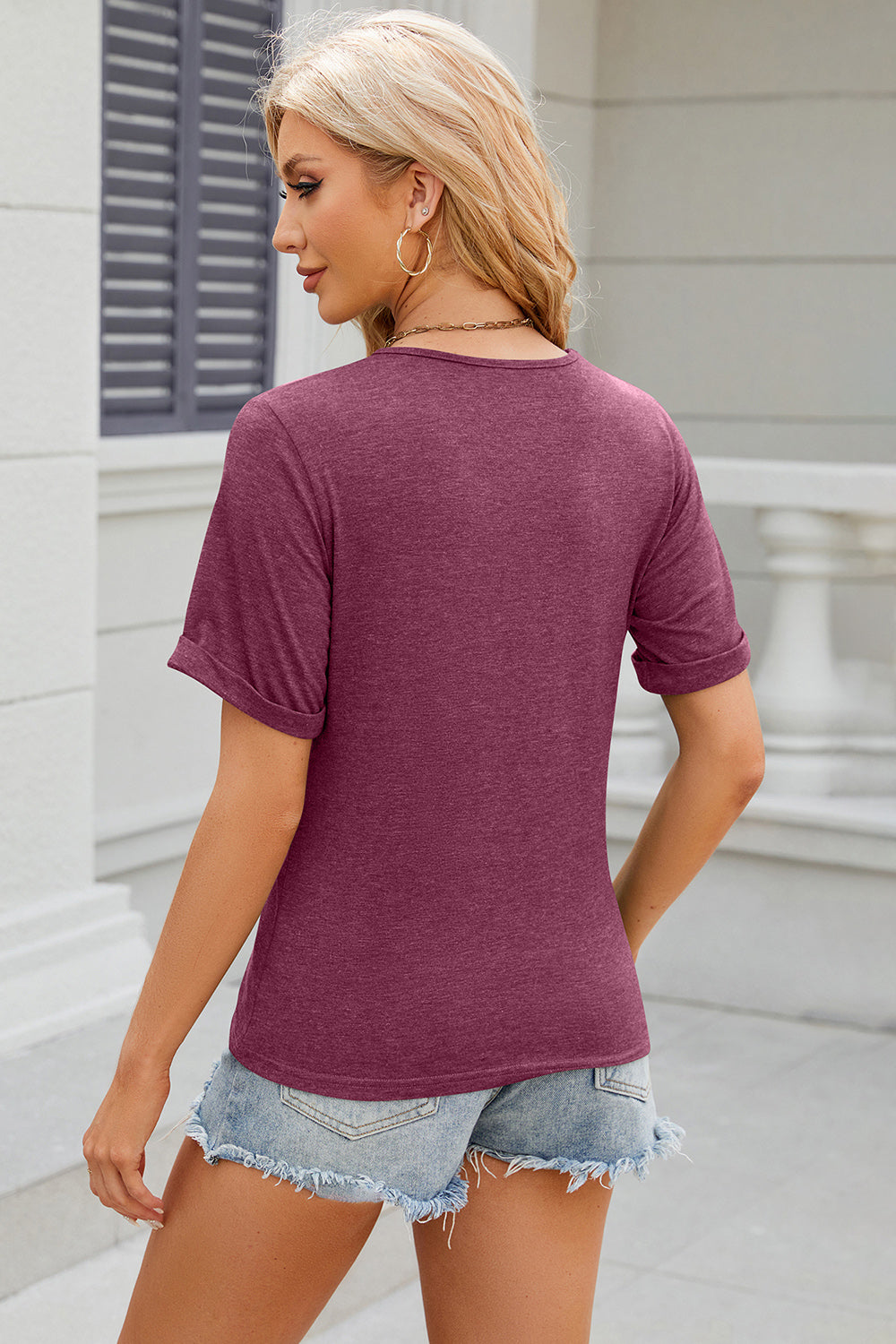 Burgundy casual t-shirt with cuffed short sleeves and a crew neck.