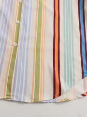 Prismatic stripe band collar blouse with button front and multicolor stripes.