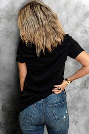 Black t-shirt with denim bow embellishment detail on the back