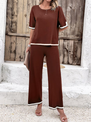 Brown knit co-ord set with contrast trim on sleeves and hem, featuring wide-leg pants.