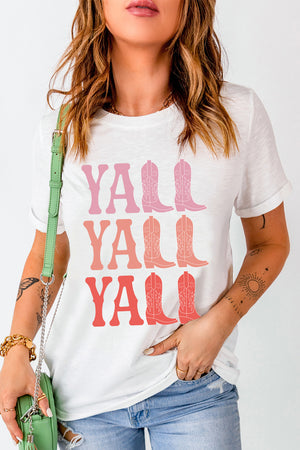 White t-shirt with a graphic print of "Y'all" repeated three times with cowboy boots.