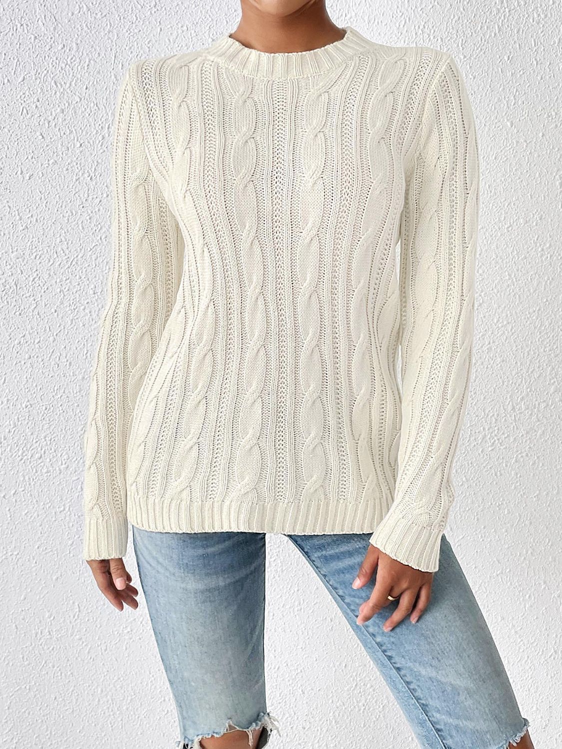 Ivory cable knit mock neck sweater with long sleeves, casual acrylic knit.