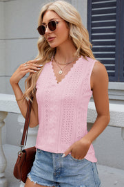Scalloped eyelet V-neck sleeveless top in blush pink with lace detail.