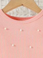 Pink ribbed baby top with pearl embellishments