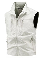 Men's beige multi-pocket outdoor vest with full zip and stand collar.
