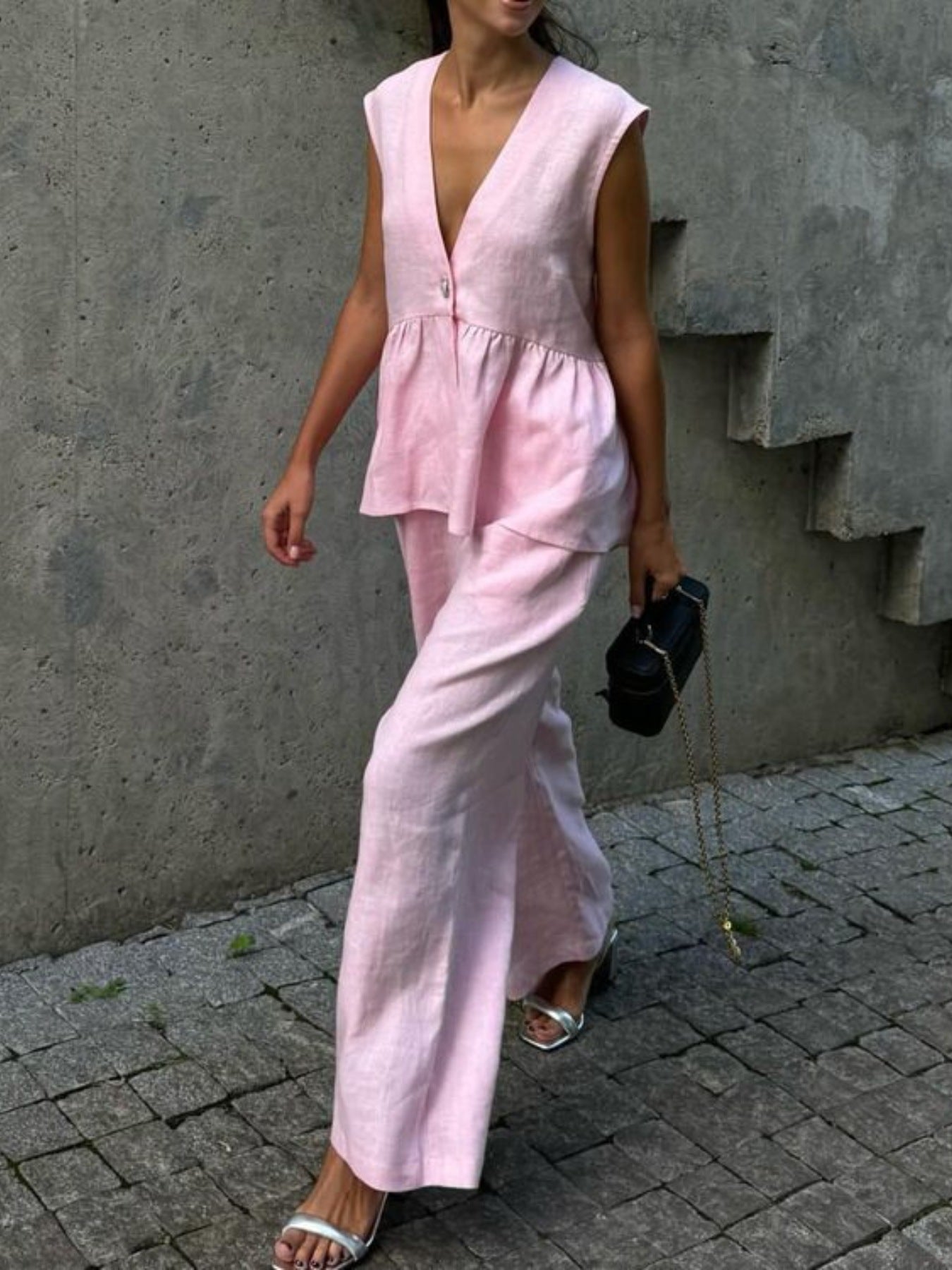 Sleeveless pink linen blend peplum top and wide-leg pants set