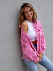 Fuchsia distressed denim shacket with frayed hem and cuffs, worn open over a white crop top.