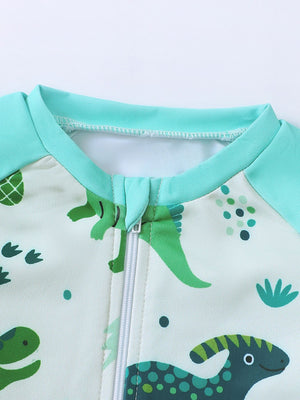 Children's turquoise dinosaur print swimwear set with zipper closure.