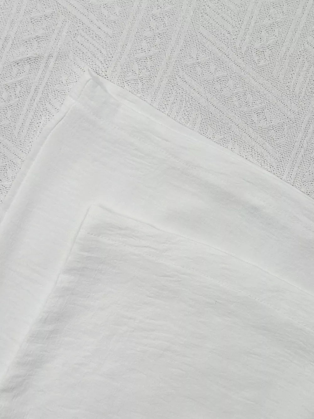 White maternity wide-leg pants with drawstring detail, relaxed fit