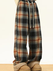 Men's plus-size plaid sweatpants with drawstring and elastic waist.
