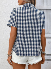 Dark blue and white gingham button-up short-sleeve shirt with a textured pattern, shown from the back.