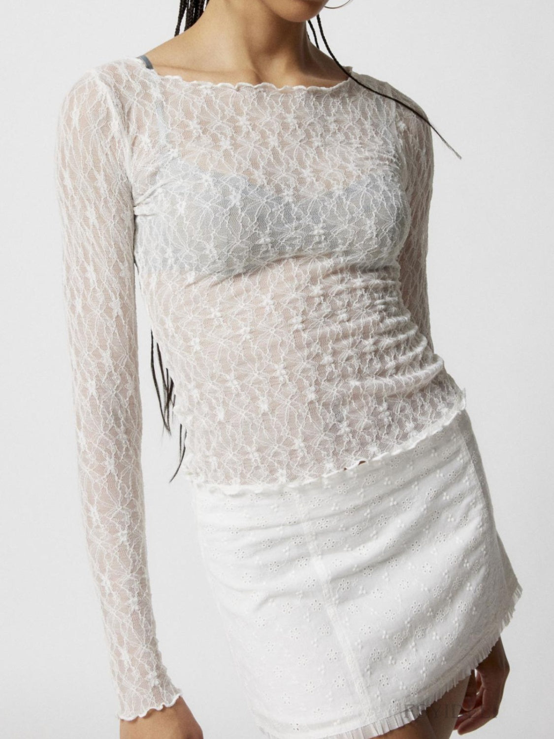 White floral lace long sleeve blouse with scalloped neckline and hem