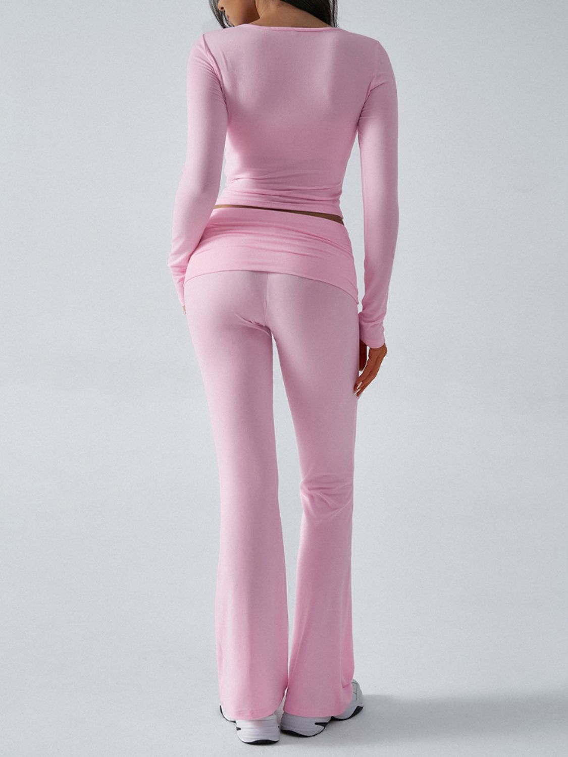 Blush pink long sleeve lounge set with flare pants from behind.