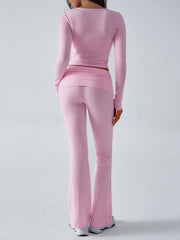 Blush pink long sleeve lounge set with flare pants from behind.