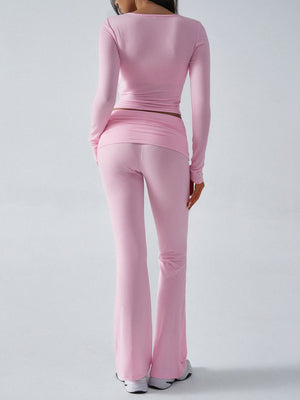 Blush pink long sleeve lounge set with flare pants from behind.