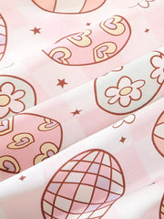 Pink cotton blend toddler pajamas with egg print, flowers, hearts, and stars.