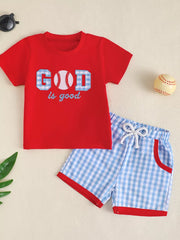 Red baseball tee with "GOD is good" graphic and blue gingham shorts set.