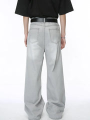 Light wash straight leg denim jeans with whiskered details and a relaxed fit.