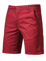 Relaxed-fit chino shorts in Deep Red with elastic waist and cuffed hem.