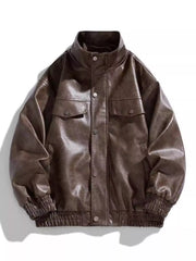 Oversized coffee faux leather bomber jacket with snap down front and chest pockets.
