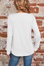 White long sleeve top with square neckline and subtle pleats, casual chic style