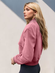 Boxy bomber jacket in dusty pink with a relaxed fit and pocket detail.