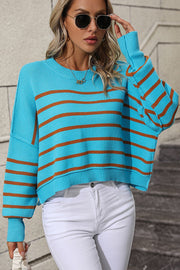 Aqua and brown striped boxy knit sweater with crew neck and long sleeves.
