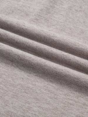 Light grey acrylic knit vest with subtle texture detail