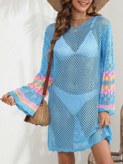 Light blue crochet cover-up with colorful striped bell sleeves and a round neckline.