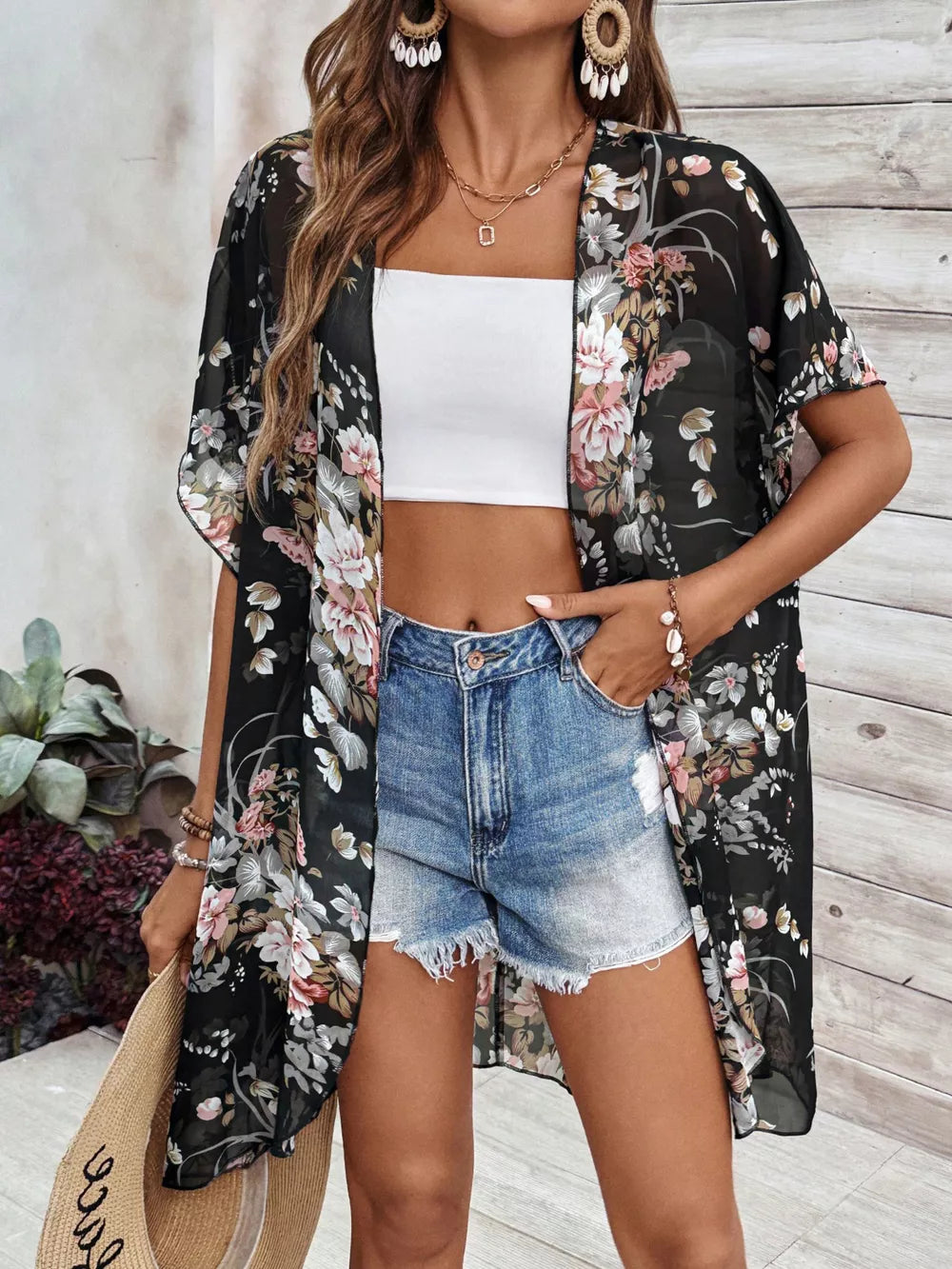 Sheer floral print lightweight open-front cardigan with short sleeves.