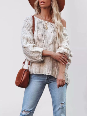 Rust pullover sweater featuring oversized and cable knit