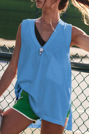 Oversized pastel blue V-neck tank top with a chest pocket and side slits.