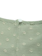 Sage textured dot puff sleeve blouse with button closure at neckline