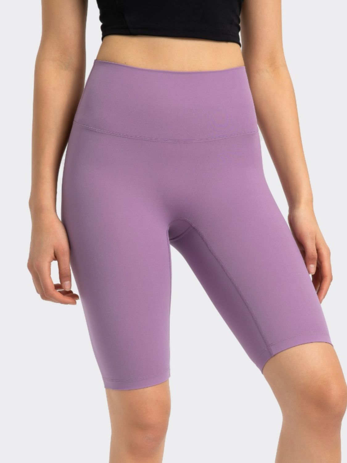 Lavender activewear shorts with a high waist and sculpted fit.