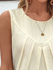 Beige sleeveless top with vertical texture and front pleats