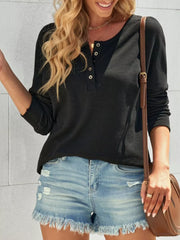 Black textured buttoned henley shirt with a scoop neck and long sleeves.