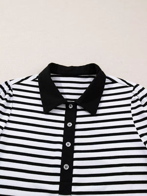 Black and white striped collared long sleeve dress with button front detail.
