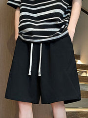 Men's black lightweight drawstring shorts with white drawstrings.