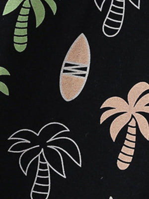 Black cotton boys' underwear set with playful tropical palm tree and surfboard print.