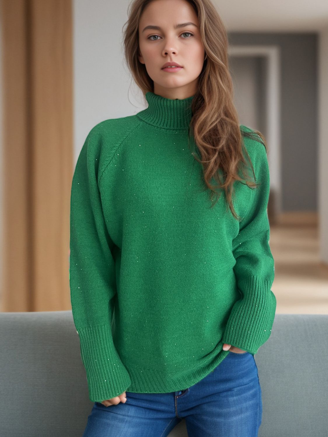 Dark green ribbed turtleneck sweater with subtle sparkle details and cuffed sleeves.
