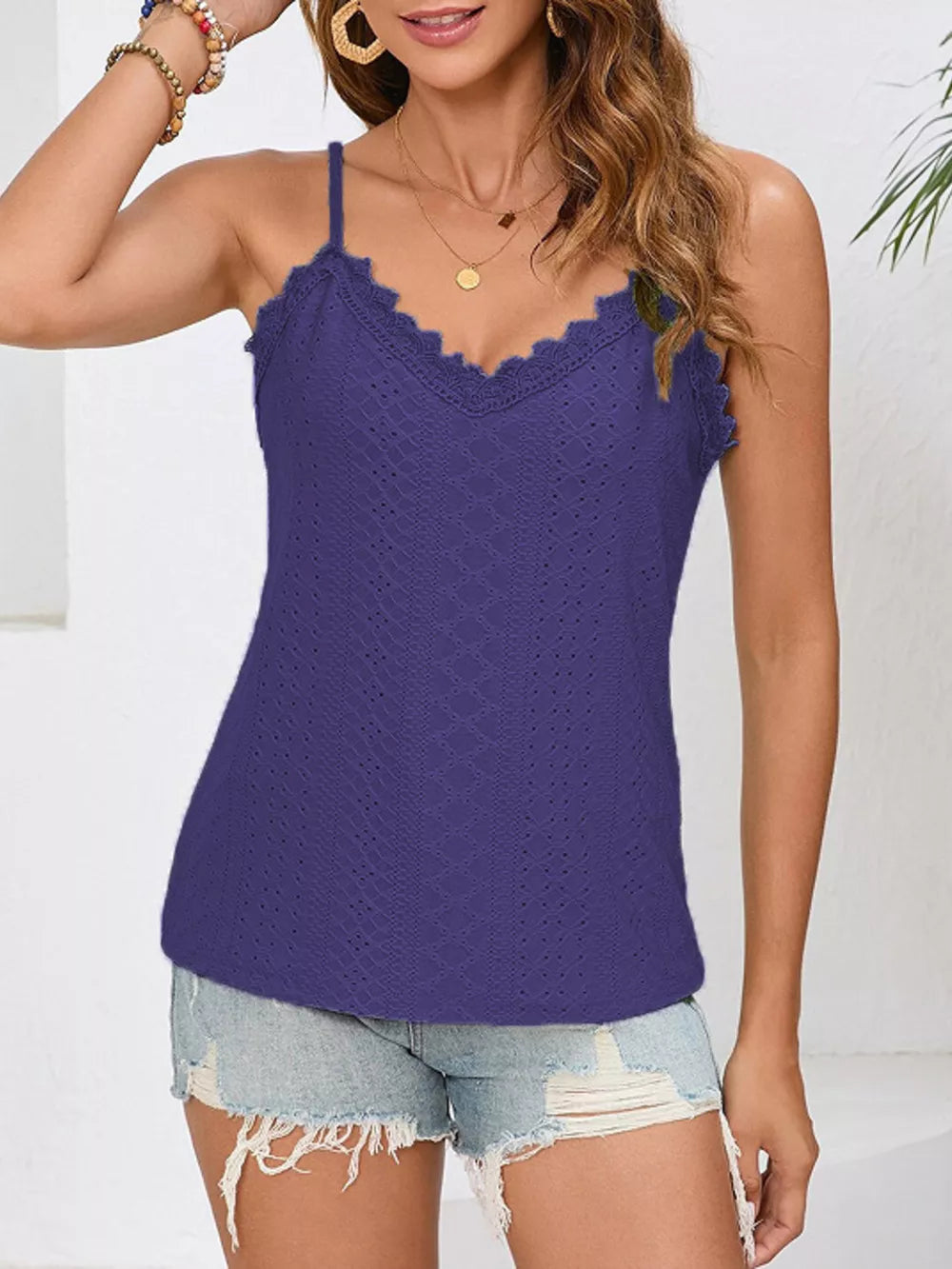 Purple lace-trimmed V-neck camisole with eyelet detail.