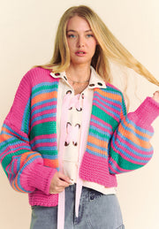 Chunky stripe balloon sleeve cardigan in pink with multicolor stripes and lace-up detail.